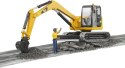 Minikoparka CAT z figurka robotnika Minikoparka CAT z figurka robotnika